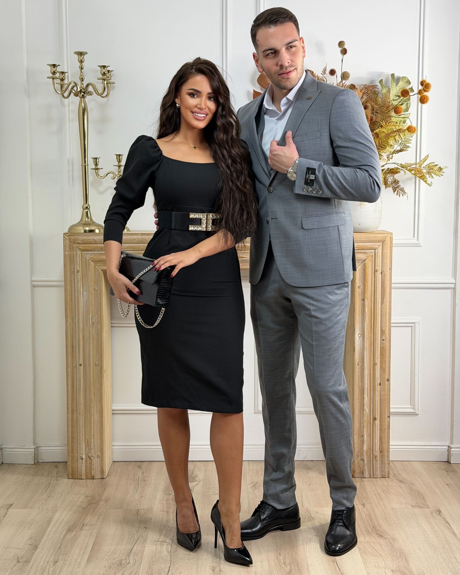 Crna haljina do kolena sa puf rukavima